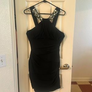 Enjoy seasonless appeal with this comfortable City Triangles dress